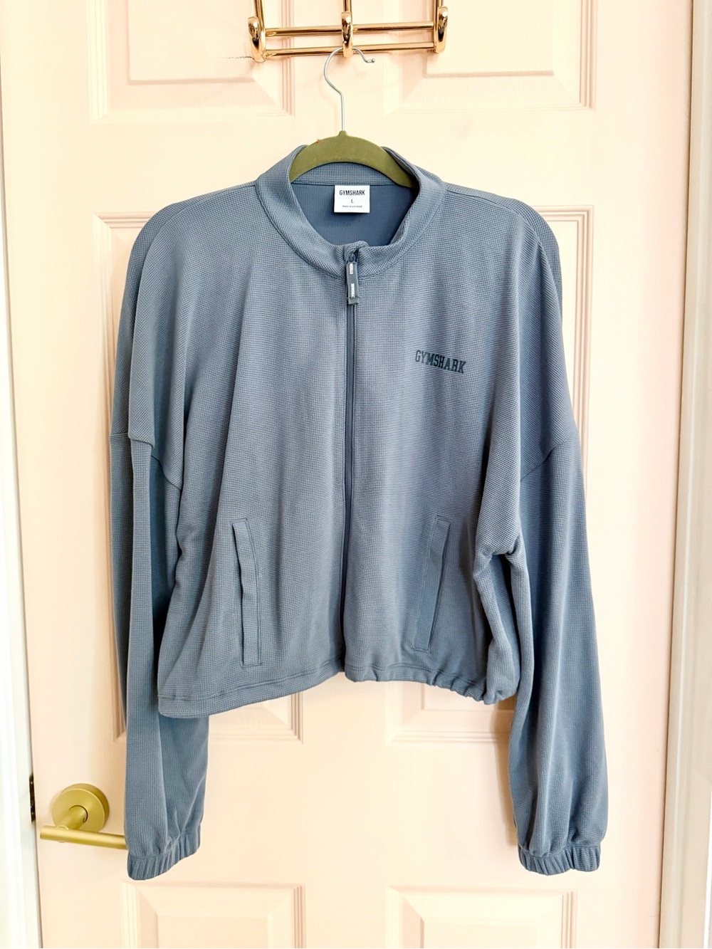 Blue gymshark crop jacket